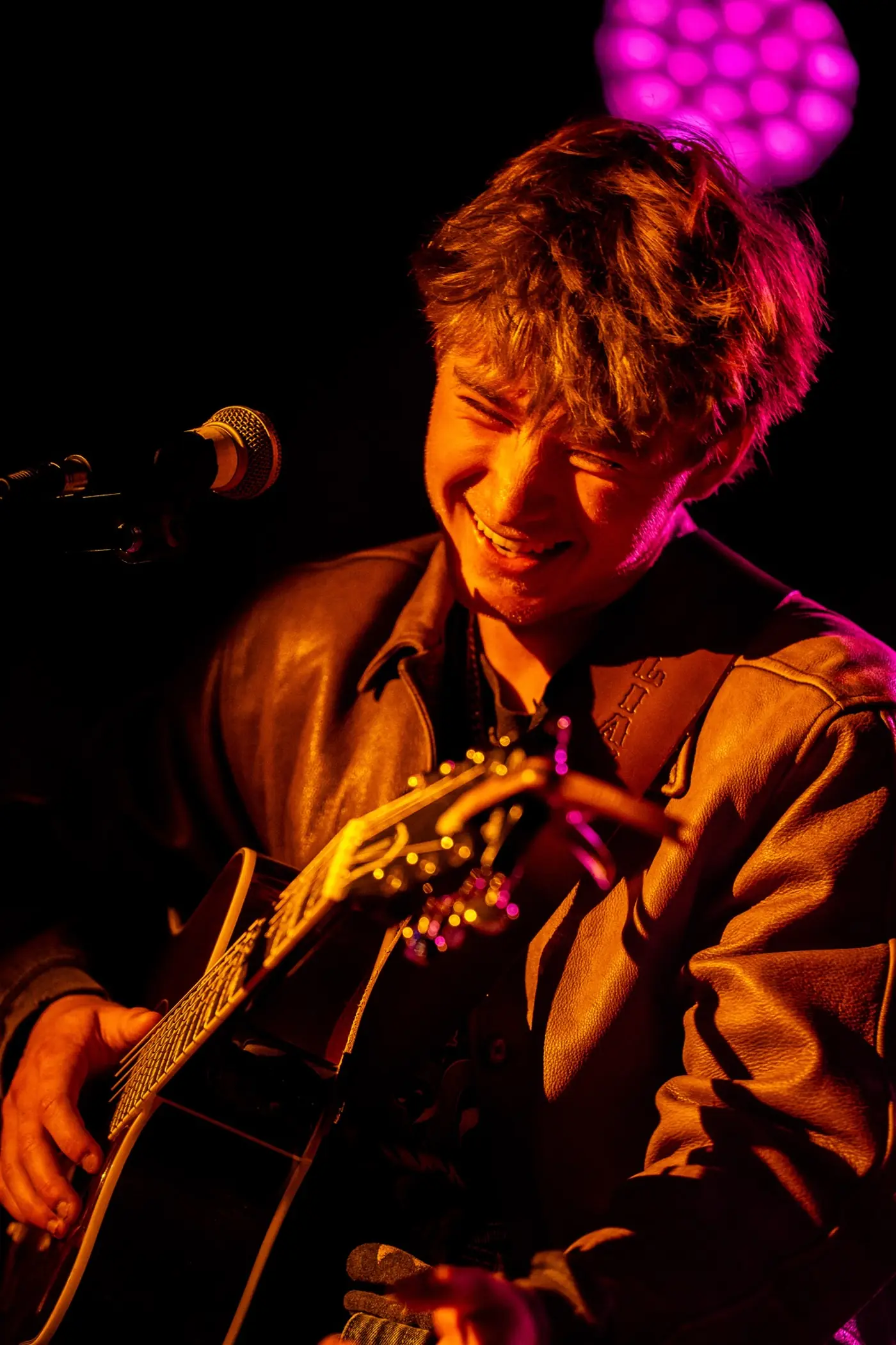 Cameron laughing while playing